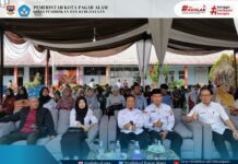 Kepala Dinas Pendidikan dan Kebudayaan Kota Pagar Alam diwakili Sekretaris Dinas membuka Festival dan Lomba Seni di SMP Negeri 1 Kota Pagar Alam.